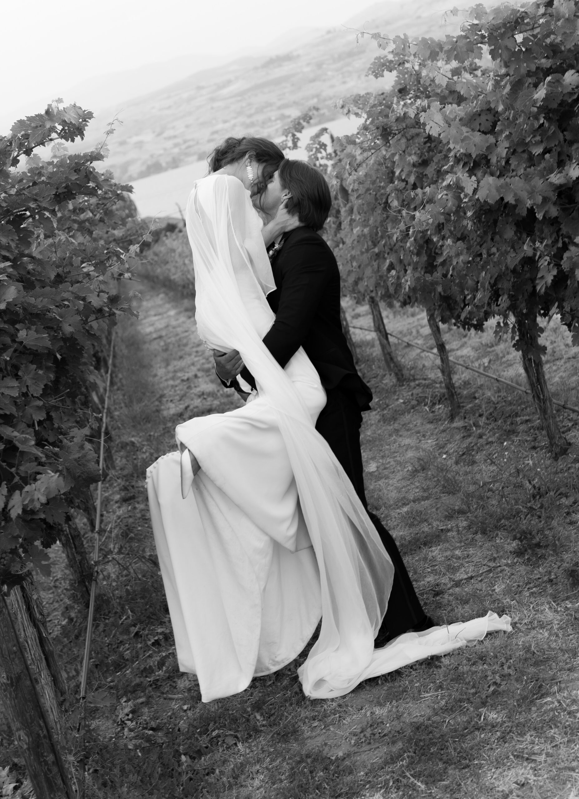 Bride and groom photos at Tsillan Cellars winery in Chelan, Washington